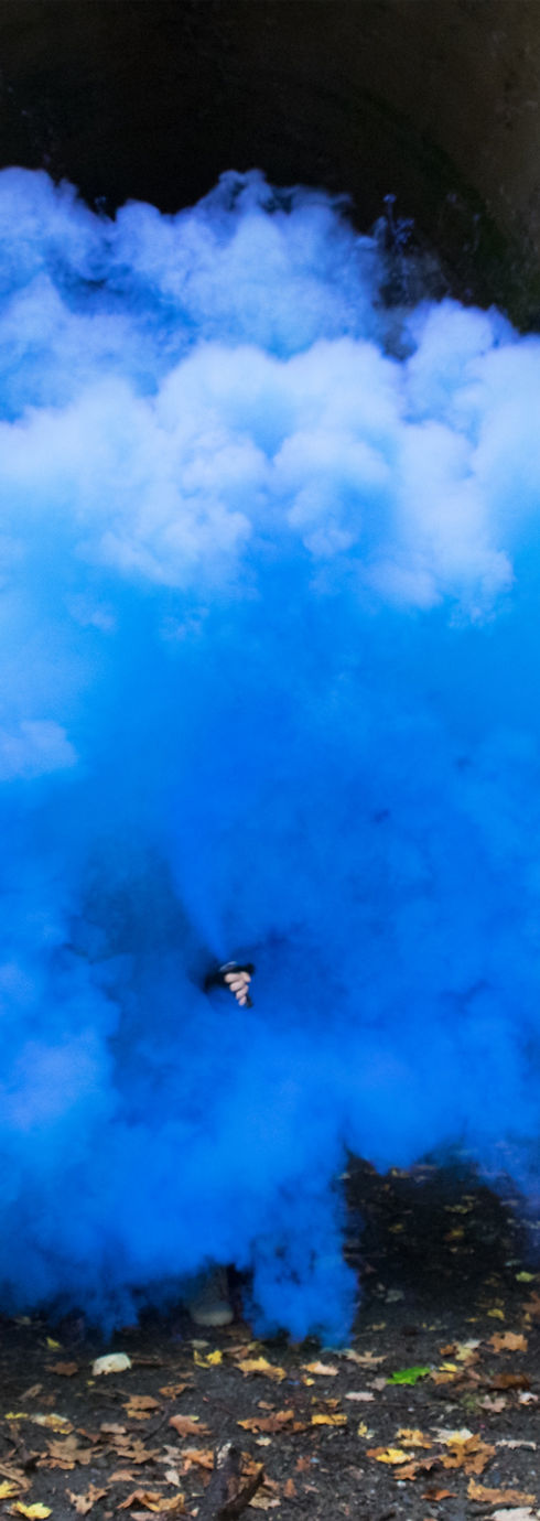 Blue Colored Smoke in Alley