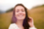 front-view-smiley-woman-posing-outside.jpg