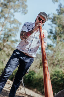 Ganga Giri playing didgerdidoo at a wedding