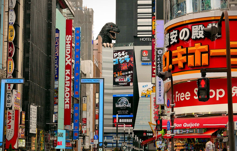 The "life-sized" Godzilla statue peers over Kabukicho and shows off its impressive manicure!
