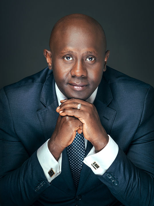 Corporate headshot, portrait of a black man.