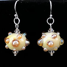 cream and gold earrrings