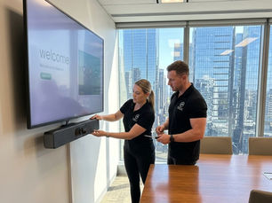 Sydney AV technologies Team installing a new device