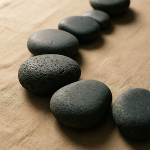 Massage aux Pierres Chaudes