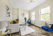 Staged open plan living/ dining room