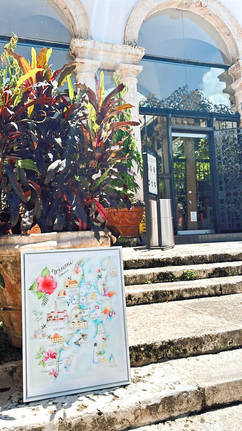 Eye-level view of a watercolor map depicting historical Miami architecture displayed at Vizcaya Museum