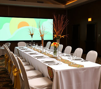 a reception table with african fabric decoration.jpg