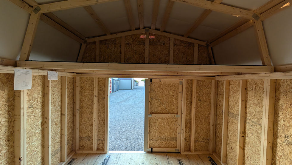 12x20 Lofted Barn Interior with Double Door, Loft, and Vapor Barrier Under Metal Roof