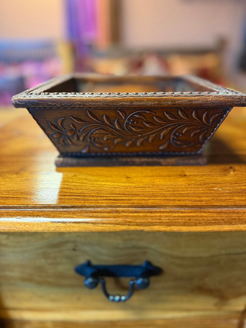 Dark stained rectangular wooden decorative tray or box with intricate carved floral patterns