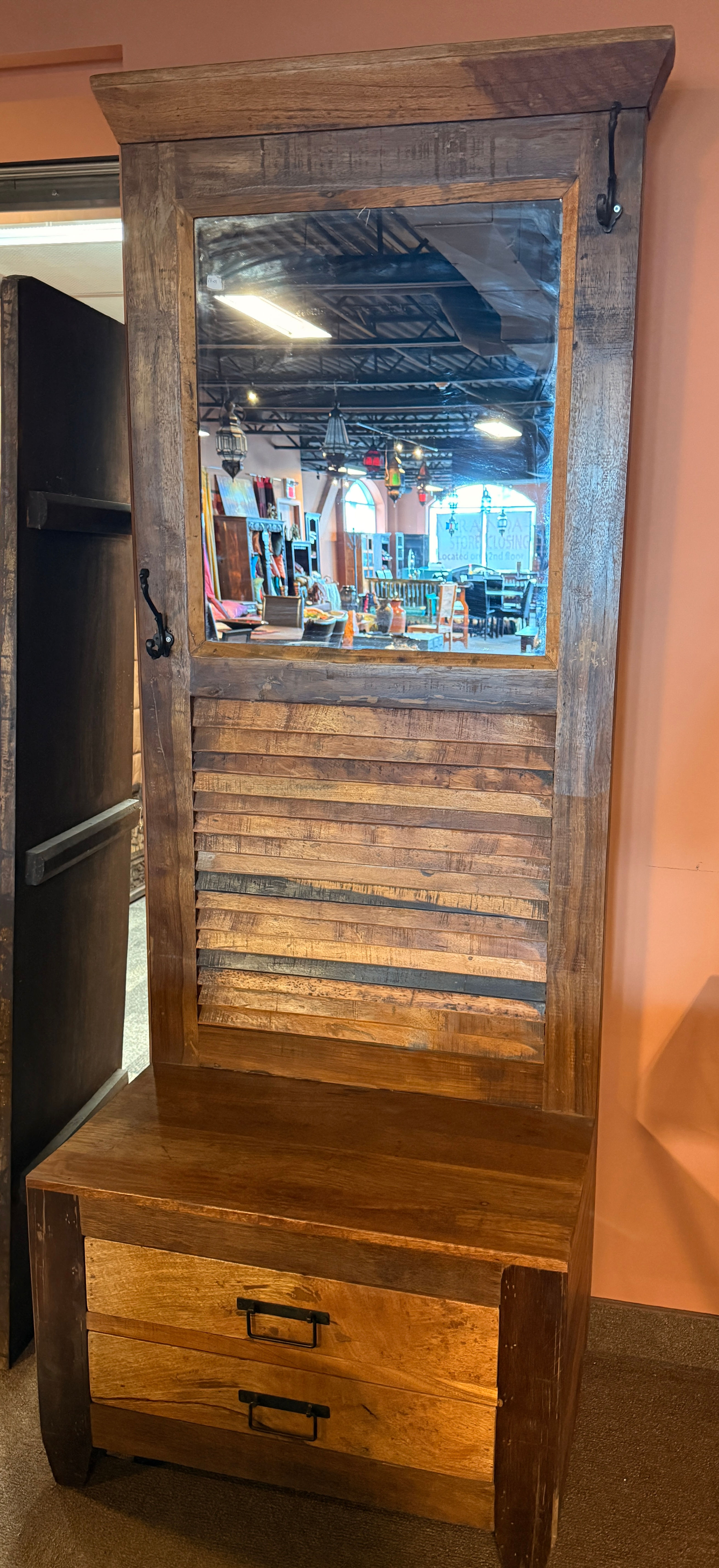 Rustic wooden entry table featuring two spacious drawers and a distressed finish