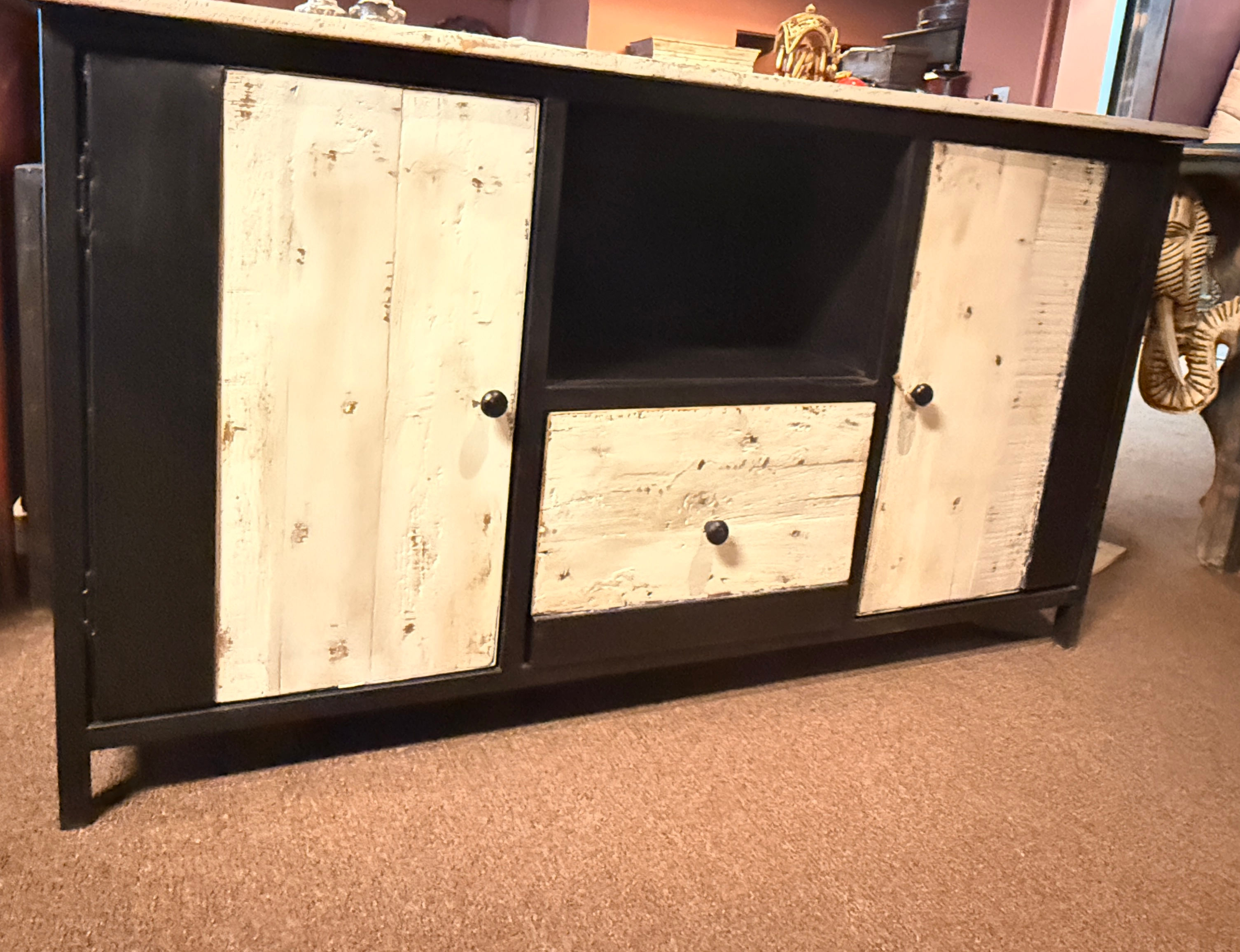 Rustic black and white wooden sideboard featuring storage cabinets, drawer, and open shelf