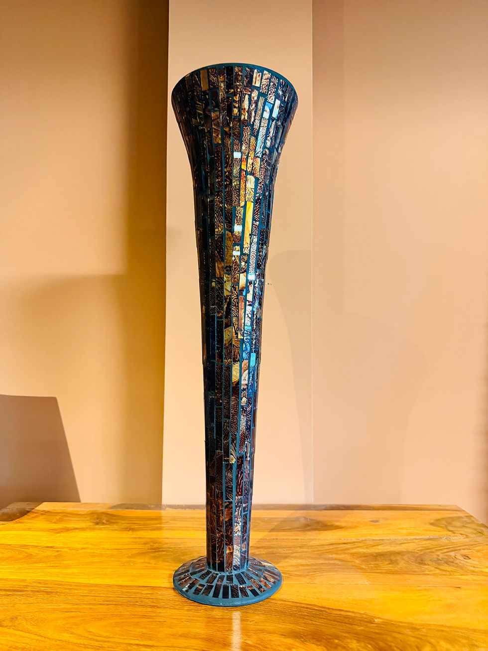 Very tall, slender decorative floor vase covered in shimmering mosaic tiles