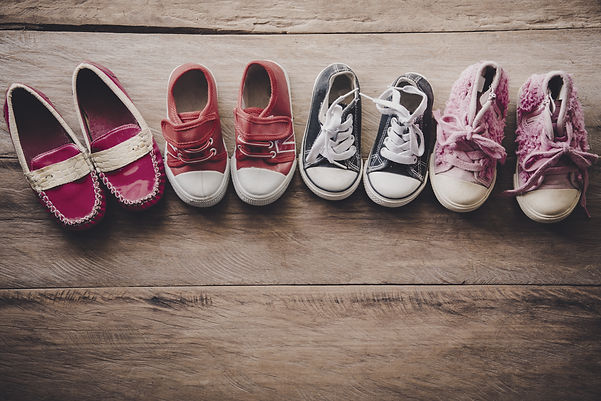 shoes-for-children-on-wooden-floor-2023-11-27-04-49-50-utc_edited.jpg