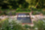 Stepping stones through the corten steel pond