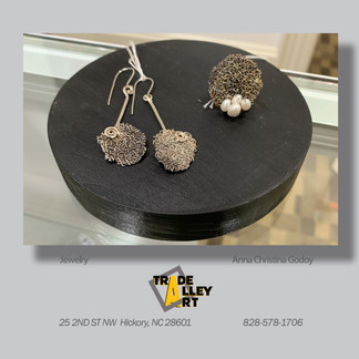 Silver earrings and pendant