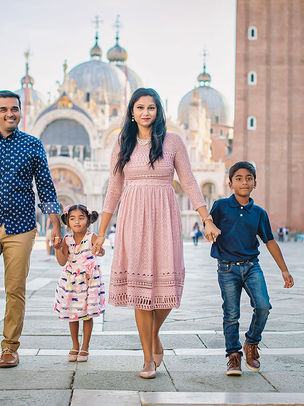 Family walking together in San Marco Square in Venice