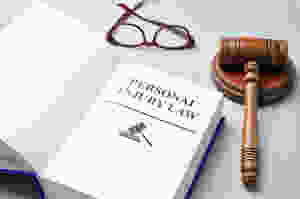 Gavel, Glasses, and Personal Injury Law Textbook