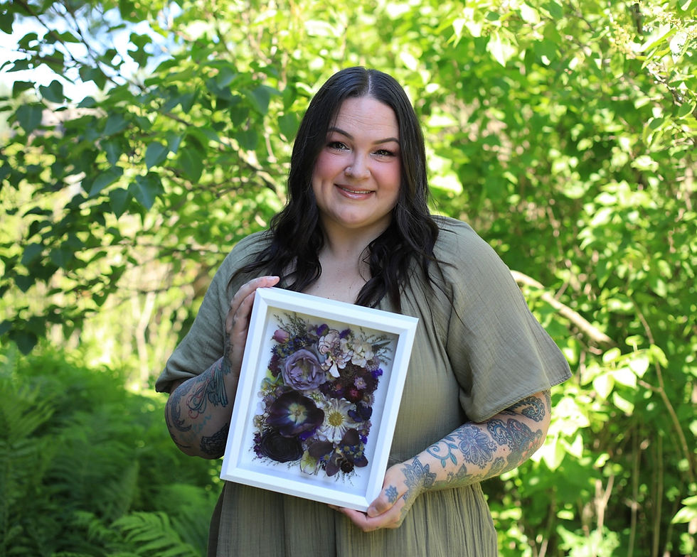 Paje Honor holding a shadow box design