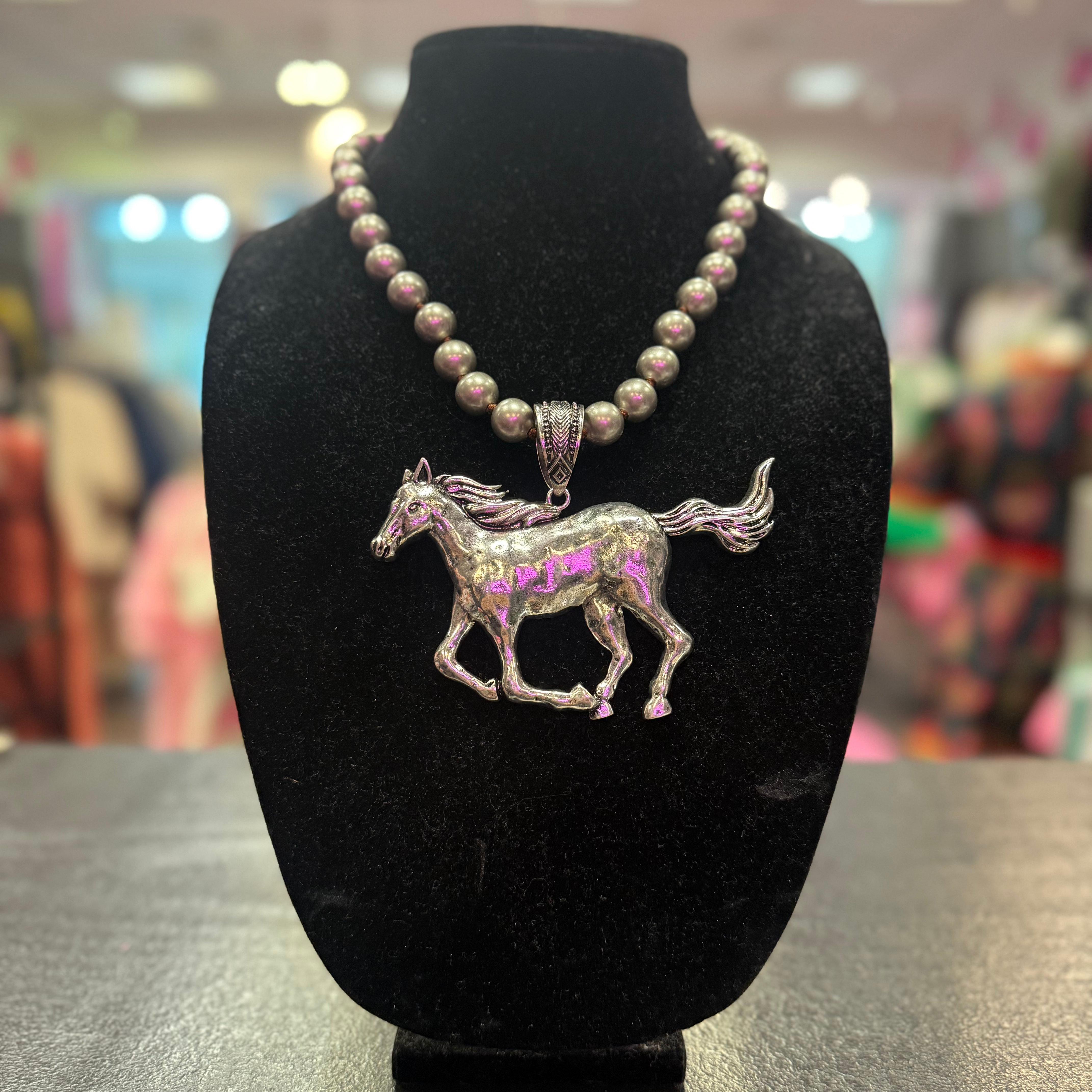 Running horse and Navajo pearl necklace