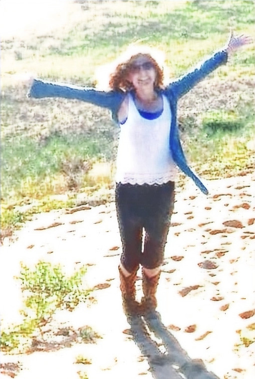 Ally arms wide open on the beach_edited_