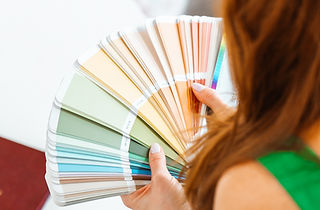 Phase 2 | Stella Studio | Interior Designer in Geneva choosing color on a swatch