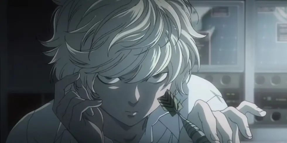 Near playing with his hair