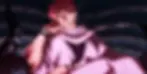 Sukuna sitting and smiling