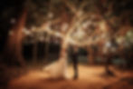 Couple dancing with dimmed lights in wedding photography