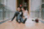 Couple seated on floor for pre-wedding photoshoot