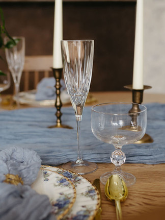 Something Blue wedding inspiration, blue wedding color palette ideas, romantic blue wedding decor, soft blue wedding florals, monochromatic blue wedding cake, vintage piped wedding cake design, blue and white wedding tablescape, Alberta styled wedding shoot, modern romantic wedding inspiration, blue floral wedding centerpiece, curated wedding dessert bar display, floral cake garden design, wedding cake with tonal blue florals, editorial wedding photography Alberta, vintage china wedding table styling, elegant blue wedding stationery, vow books wedding detail, intimate wedding venue Alberta, real couple cake cutting moment, timeless blue wedding theme