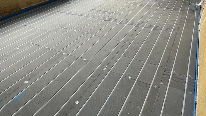 Here we have the 20mm overlay cement coated XPS panel system which we installed in Congleton, Cheshire.