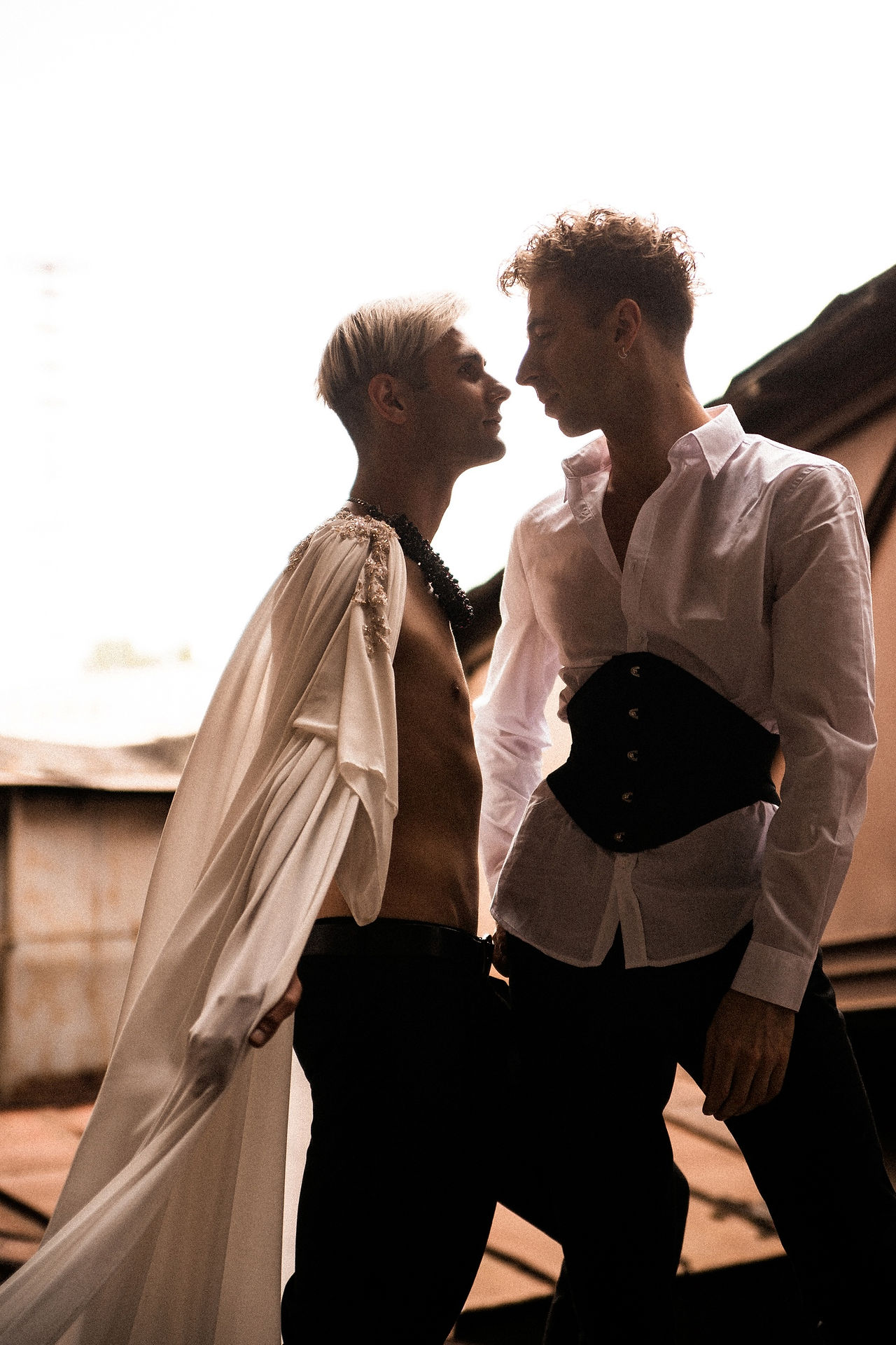 two gay looking at each other passionately as they get married in Denmark