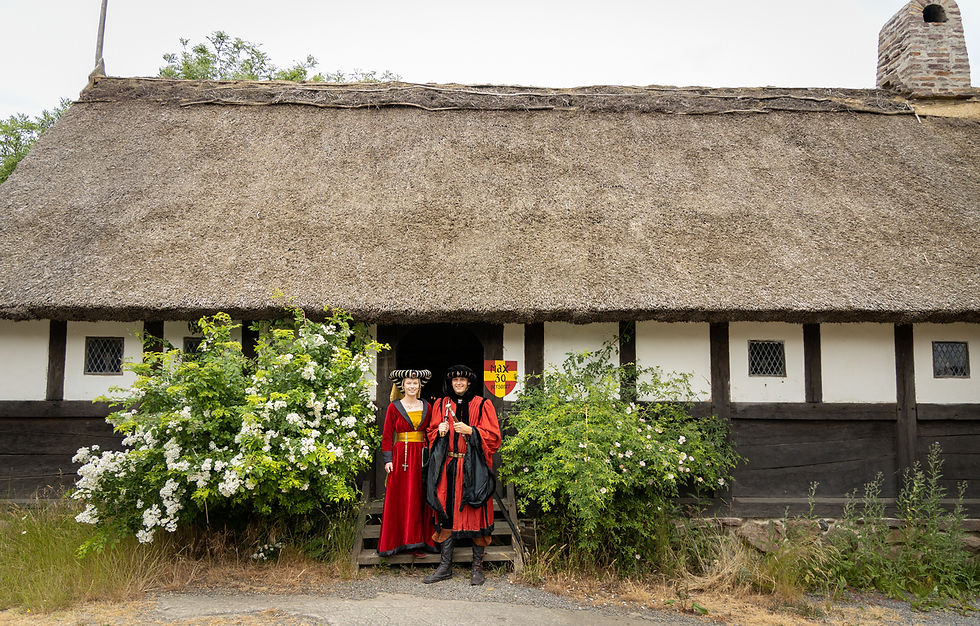 Romantic medieval wedding on Bornholm with the bride and groom sharing a quiet moment together.