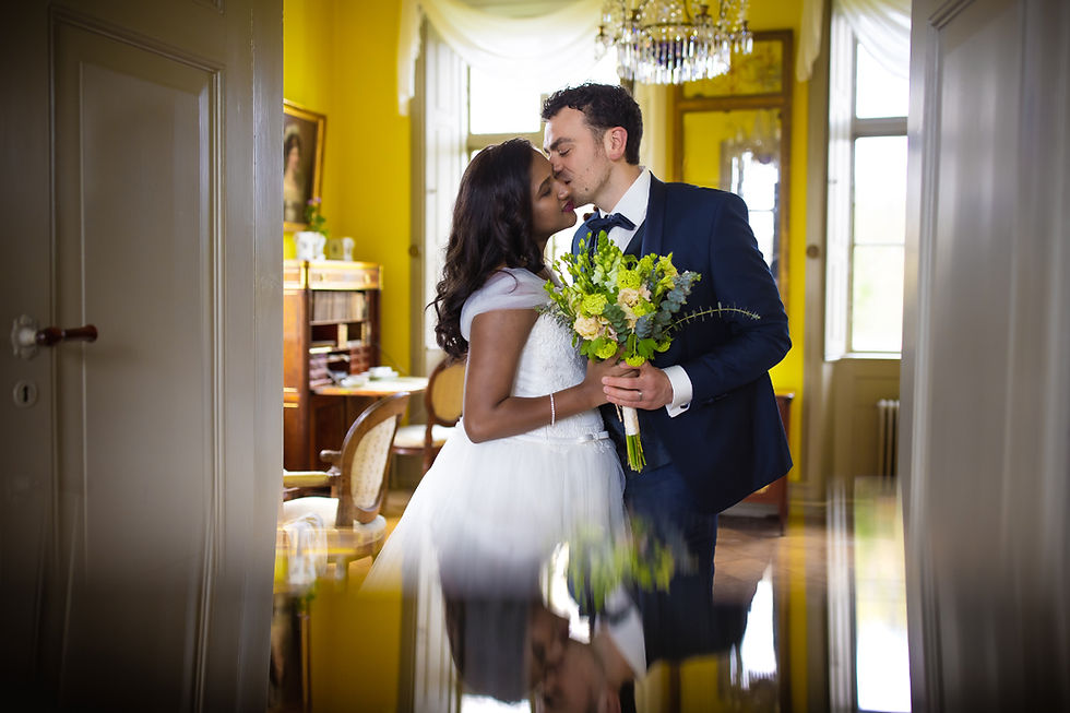 The newlyweds celebrating after their legal wedding ceremony at Pederstrup Manor in Denmark