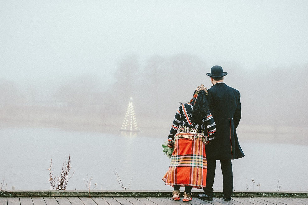 A newlyweds looking at Maribo lake after they hold their wedding in Denmark
