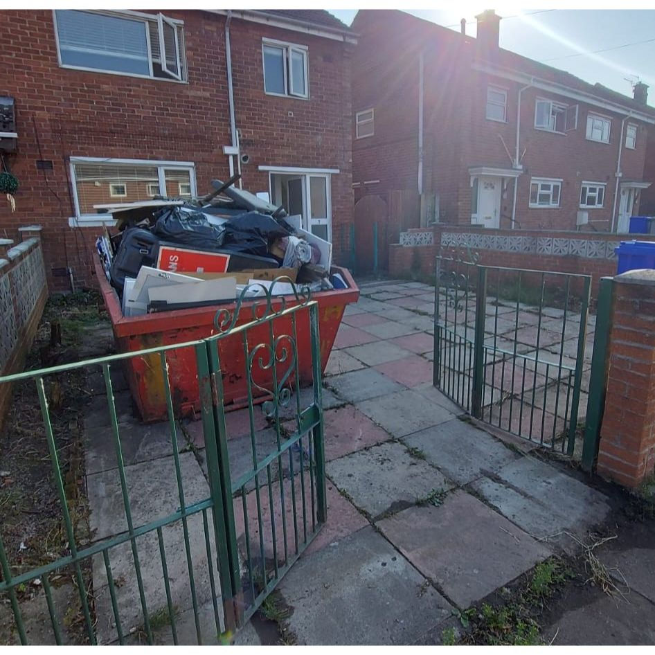 Front yard in Fegg Hayes with everything in the skip!