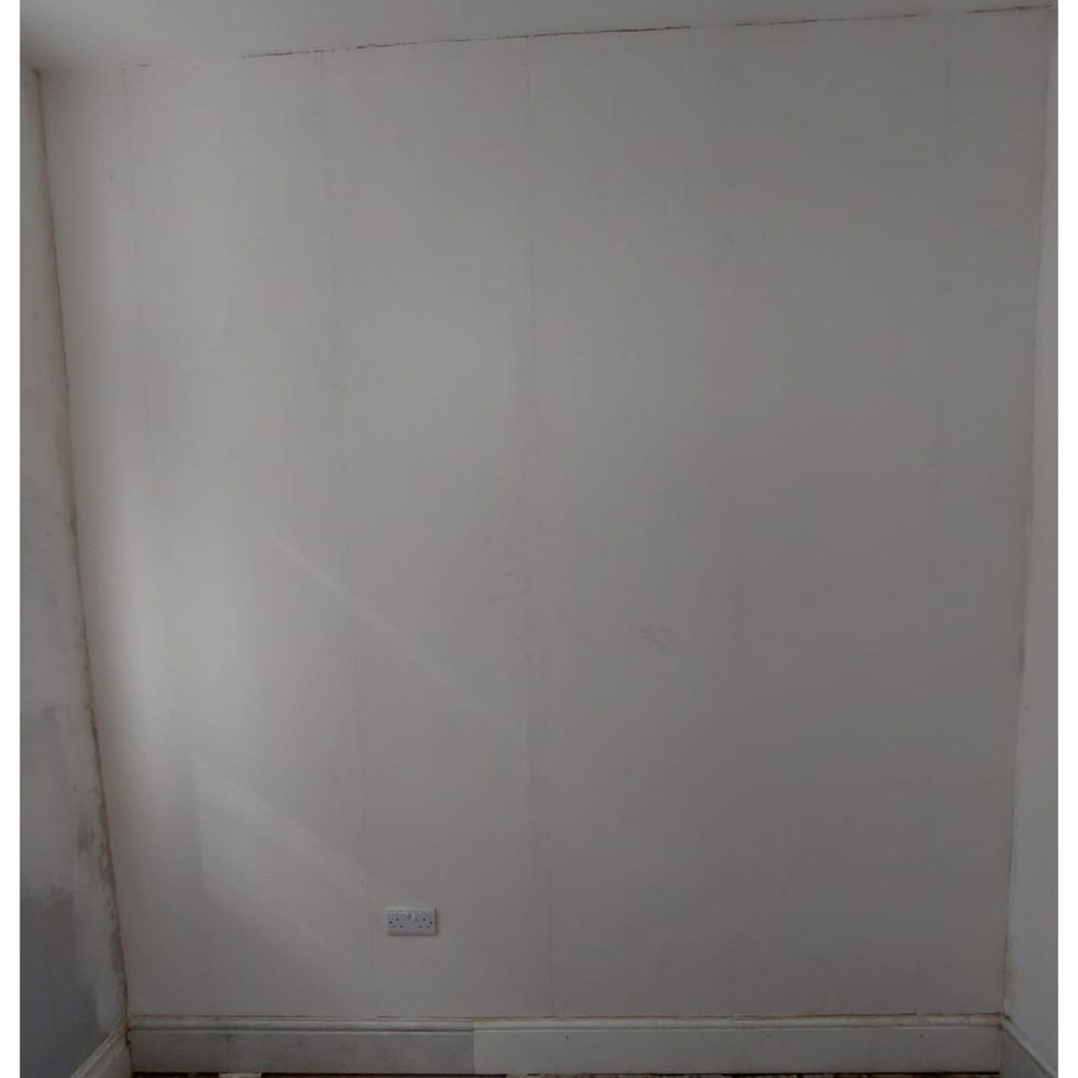 Lining a wall before painting