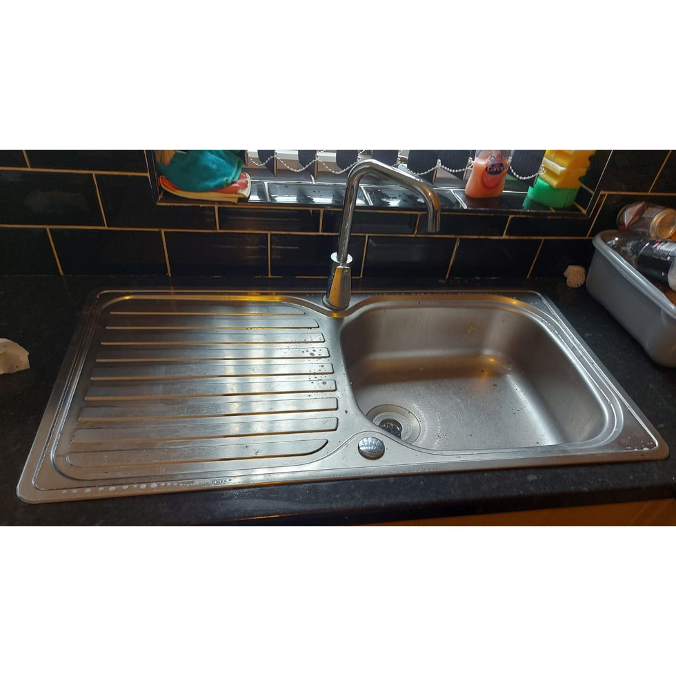 Re-siliconing a kitchen sink