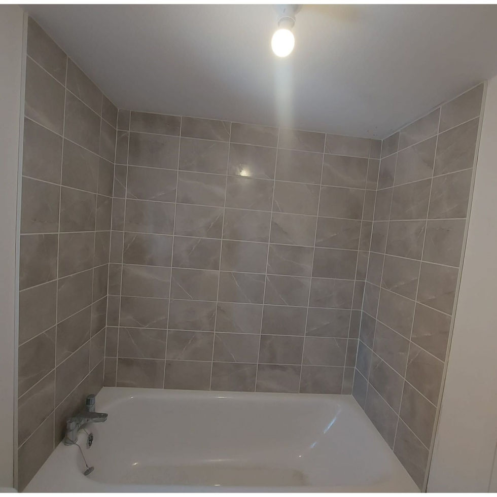 New tiles over bath as shower to be installed