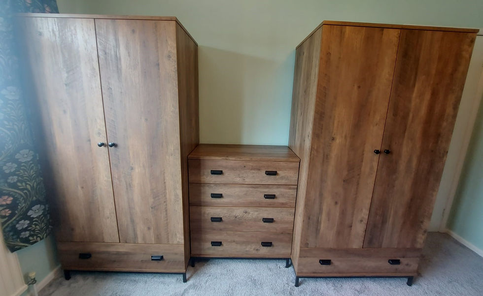 Two double wardrobes and a chest of drawers