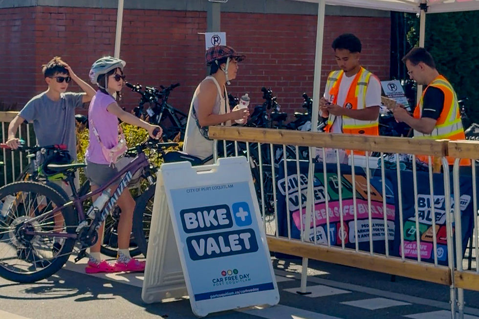 Cyclists using the free bike valet at Car Free Day 2026 in Port Coquitlam