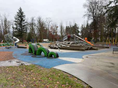 playground at Lions Park in Port Coquitlam. slides, tires, jungle gym, splash zone, big open area.