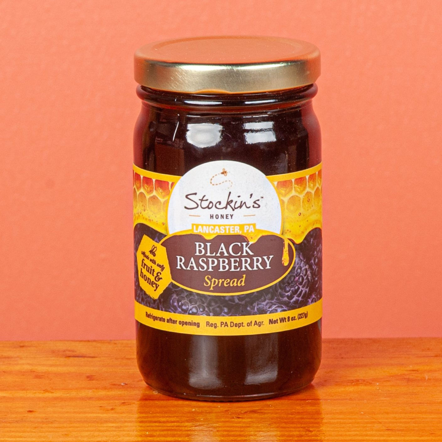 Jar of 8 oz. Stockin's Honey Black Raspberry Spread