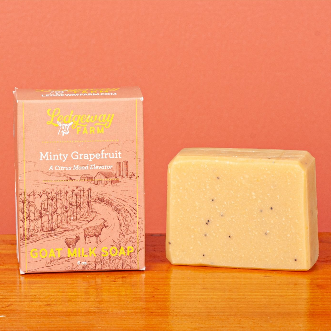 a 6 oz bar of Minty Grapefruit scented soap made with goat milk