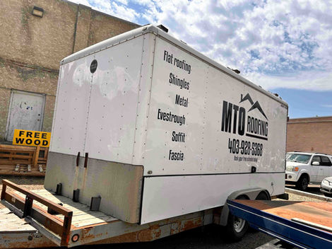 MTO Roofing enclosed trailer with contact info