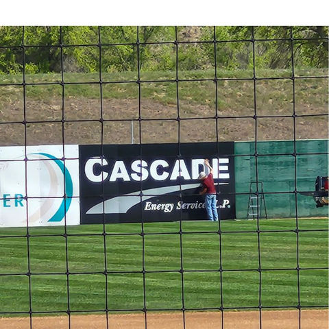 Railing signs installation at baseball field
