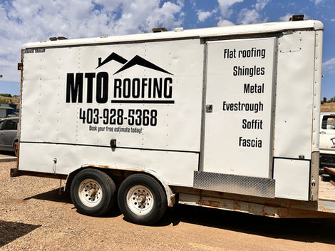 MTO Roofing trailer with services listed and phone number