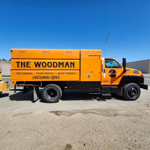 The Woodman tree service truck decals