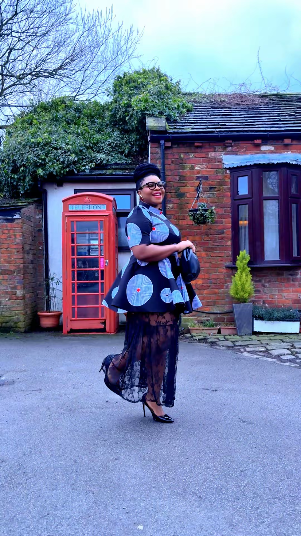 Thumbnail: Black and white peplum top