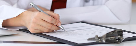 Doctor%20Checking%20a%20Form_edited.jpg